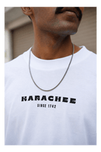 Skribi KARACHEE graphic tee worn - oversized drop shoulder fit, Pakistani streetwear
