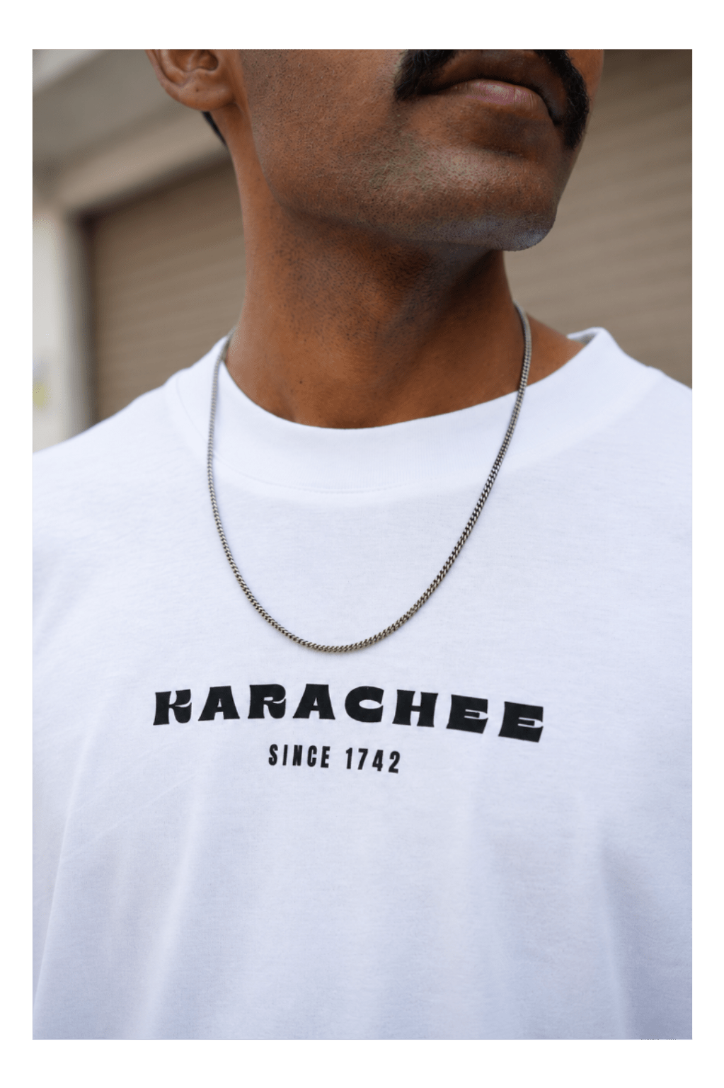 Skribi KARACHEE graphic tee worn - oversized drop shoulder fit, Pakistani streetwear