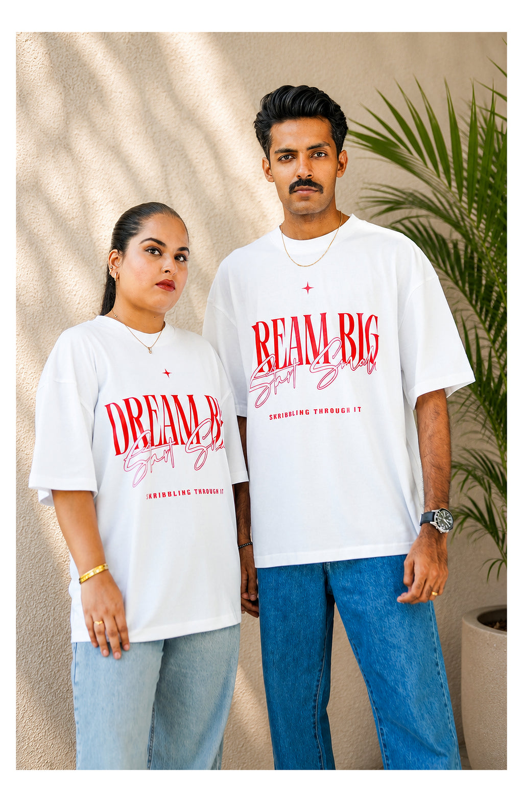 Skribi DREAM BIG graphic tee worn - oversized drop shoulder, red print on black, Drop 01