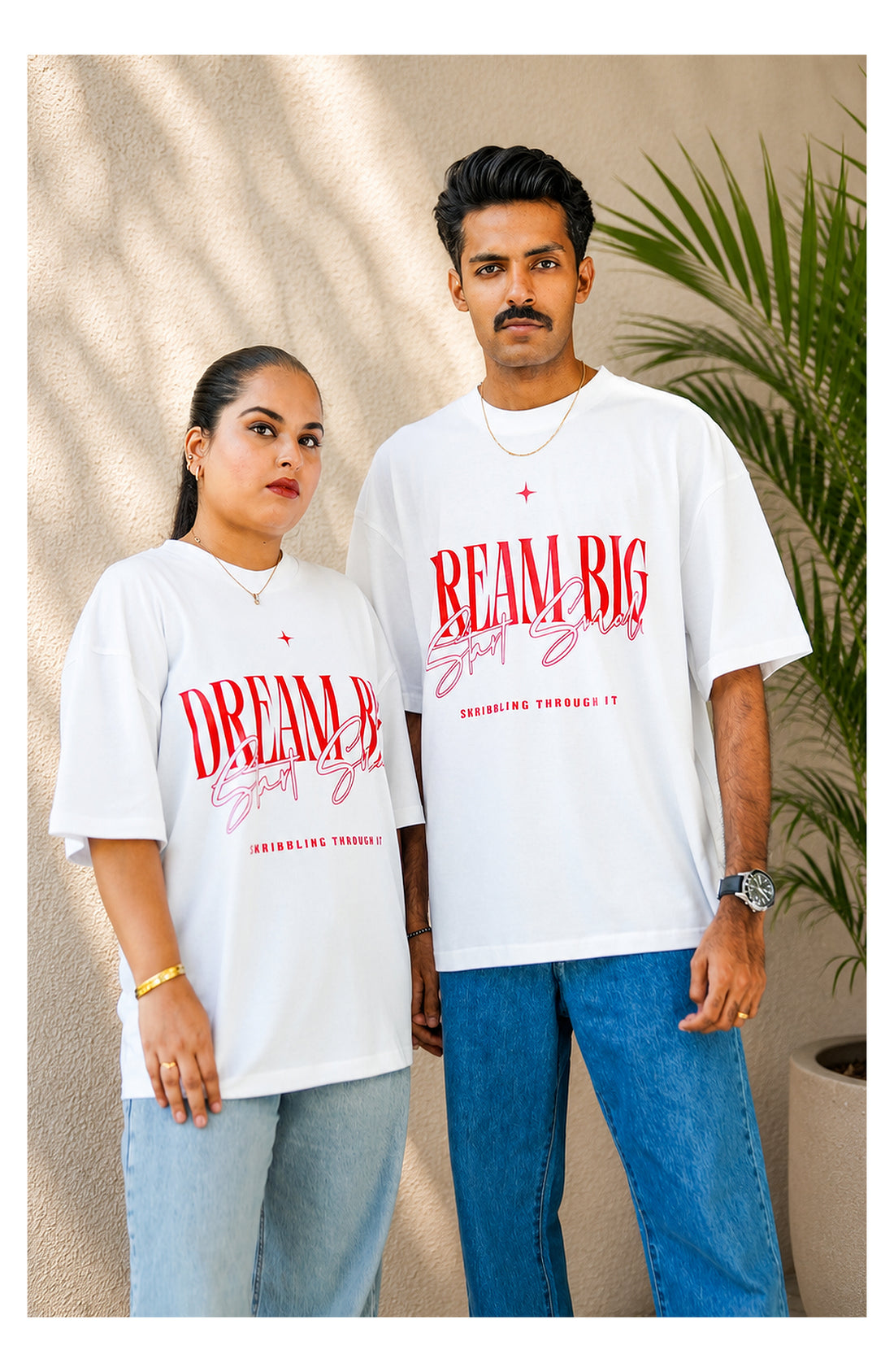 Skribi DREAM BIG graphic tee worn - oversized drop shoulder, red print on black, Drop 01