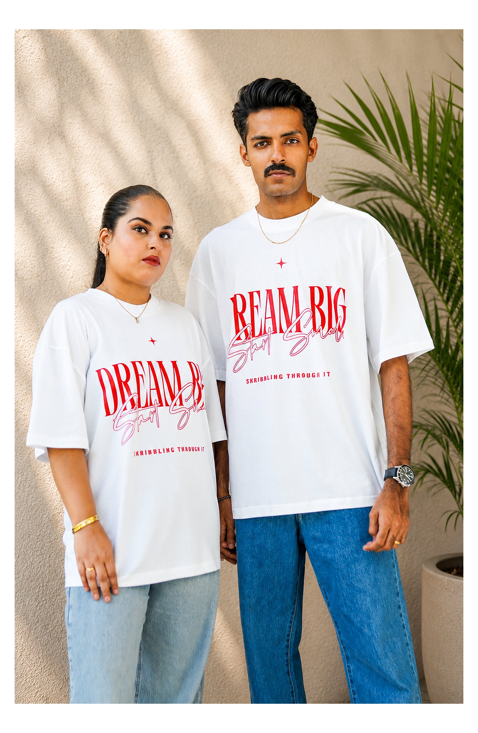 Skribi DREAM BIG graphic tee worn - oversized drop shoulder, red print on black, Drop 01